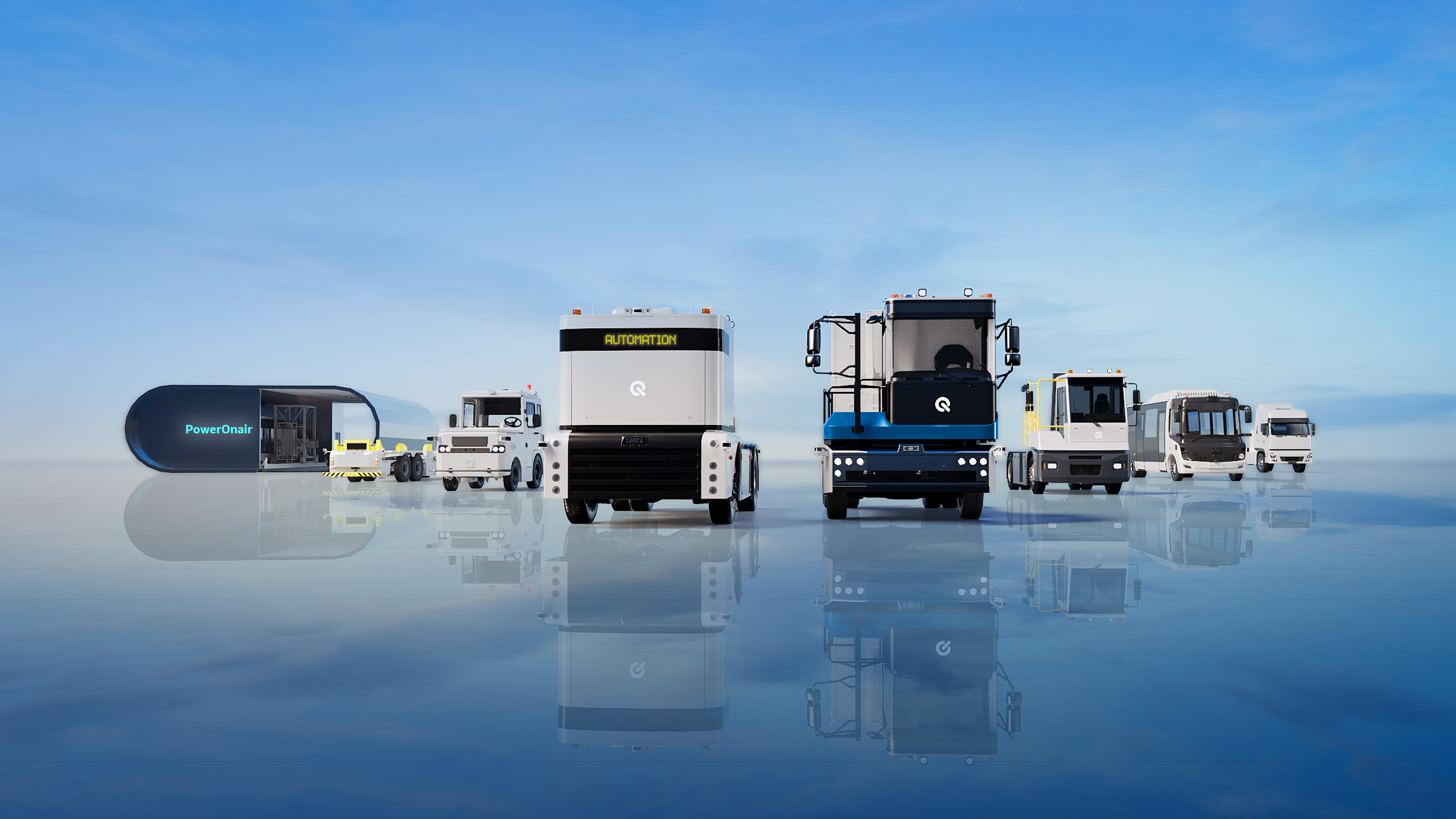  西井科技Westwell Qomolo家族产品合影，包括新能源无人驾驶牵引车、全时无人驾驶新能源集卡及智能换电站等，展现覆盖厂内与干线物流的全链路智慧物流解决方案。